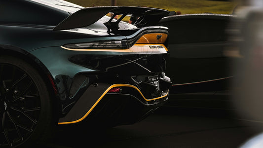 Silk and Steel: A Warm, Fashionable Review of Aston Martin—From Bamford &amp; Martin to the DB12 Era (and What Comes Next)